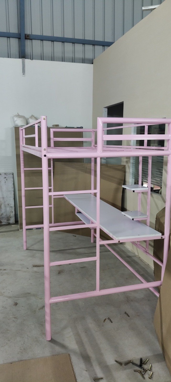 Bunk bed with mattress and study table